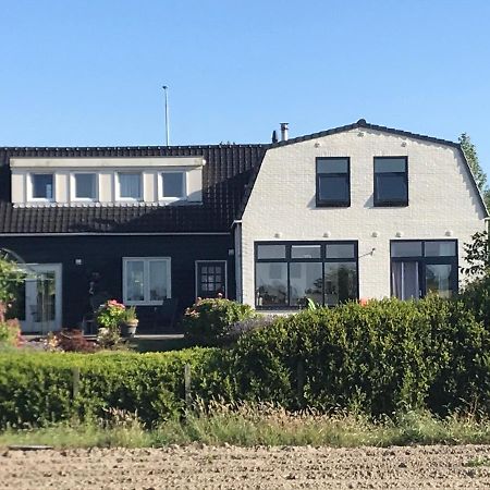 T Huuske Tuinappartement Met Fantastisch Uitzicht, Nabij Zee Zonnemaire Exterior photo