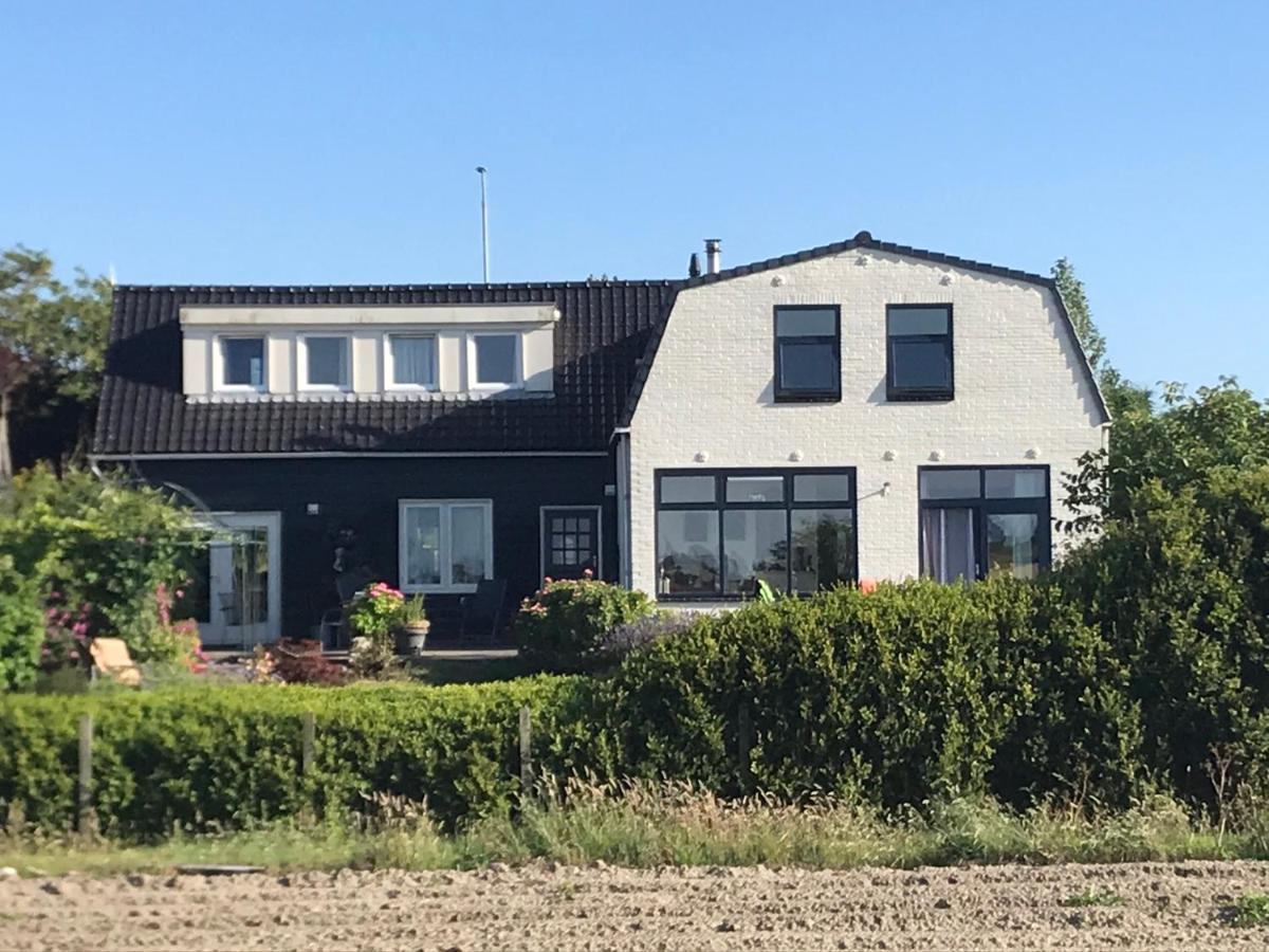 T Huuske Tuinappartement Met Fantastisch Uitzicht, Nabij Zee Zonnemaire Exterior photo