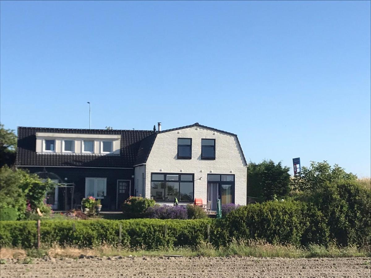 T Huuske Tuinappartement Met Fantastisch Uitzicht, Nabij Zee Zonnemaire Exterior photo