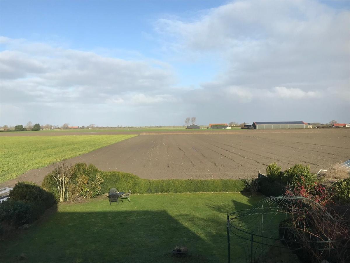 T Huuske Tuinappartement Met Fantastisch Uitzicht, Nabij Zee Zonnemaire Exterior photo